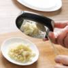 Stainless Steel Garlic Press with ergonomic handle for crushing garlic and ginger – Defilk kitchen gadget